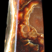 Chocolate Calcite obelisk 78*31*28mm 145g in sunlight - Rocks and Things Store