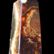 Chocolate Calcite obelisk 78*31*28mm 145g in sunlight - Rocks and Things Store