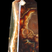 Chocolate Calcite obelisk 78*31*28mm 145g in sunlight - Rocks and Things Store