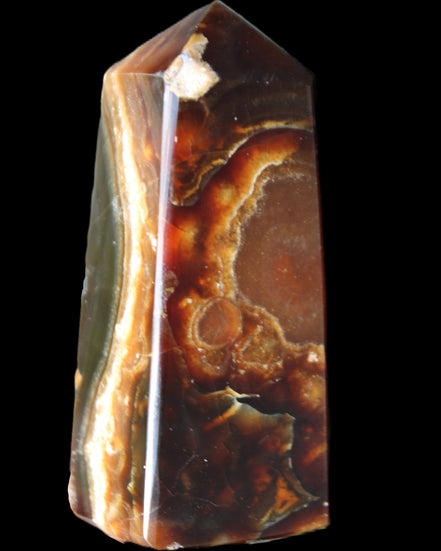 Chocolate Calcite obelisk 78*31*28mm 145g in sunlight - Rocks and Things Store