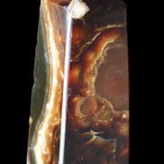 Chocolate Calcite obelisk 78*31*28mm 145g in sunlight - Rocks and Things Store