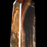 Chocolate Calcite obelisk 78*31*28mm 145g in sunlight - Rocks and Things Store