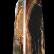 Chocolate Calcite obelisk 78*31*28mm 145g in sunlight - Rocks and Things Store