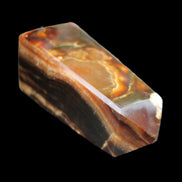 Chocolate Calcite obelisk 78*31*28mm 145g in sunlight - Rocks and Things Store