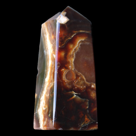 Chocolate Calcite obelisk 78*31*28mm 145g in sunlight - Rocks and Things Store