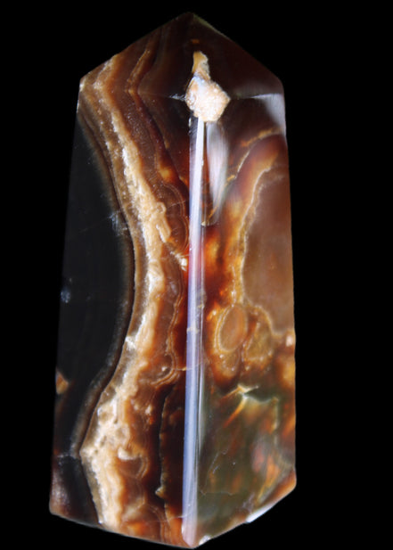 Chocolate Calcite obelisk 78*31*28mm 145g in sunlight - Rocks and Things Store
