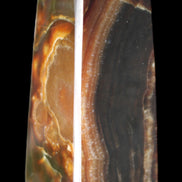 Chocolate Calcite obelisk 78*31*28mm 145g in sunlight - Rocks and Things Store