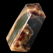 Chocolate Calcite obelisk 78*31*28mm 145g in sunlight - Rocks and Things Store