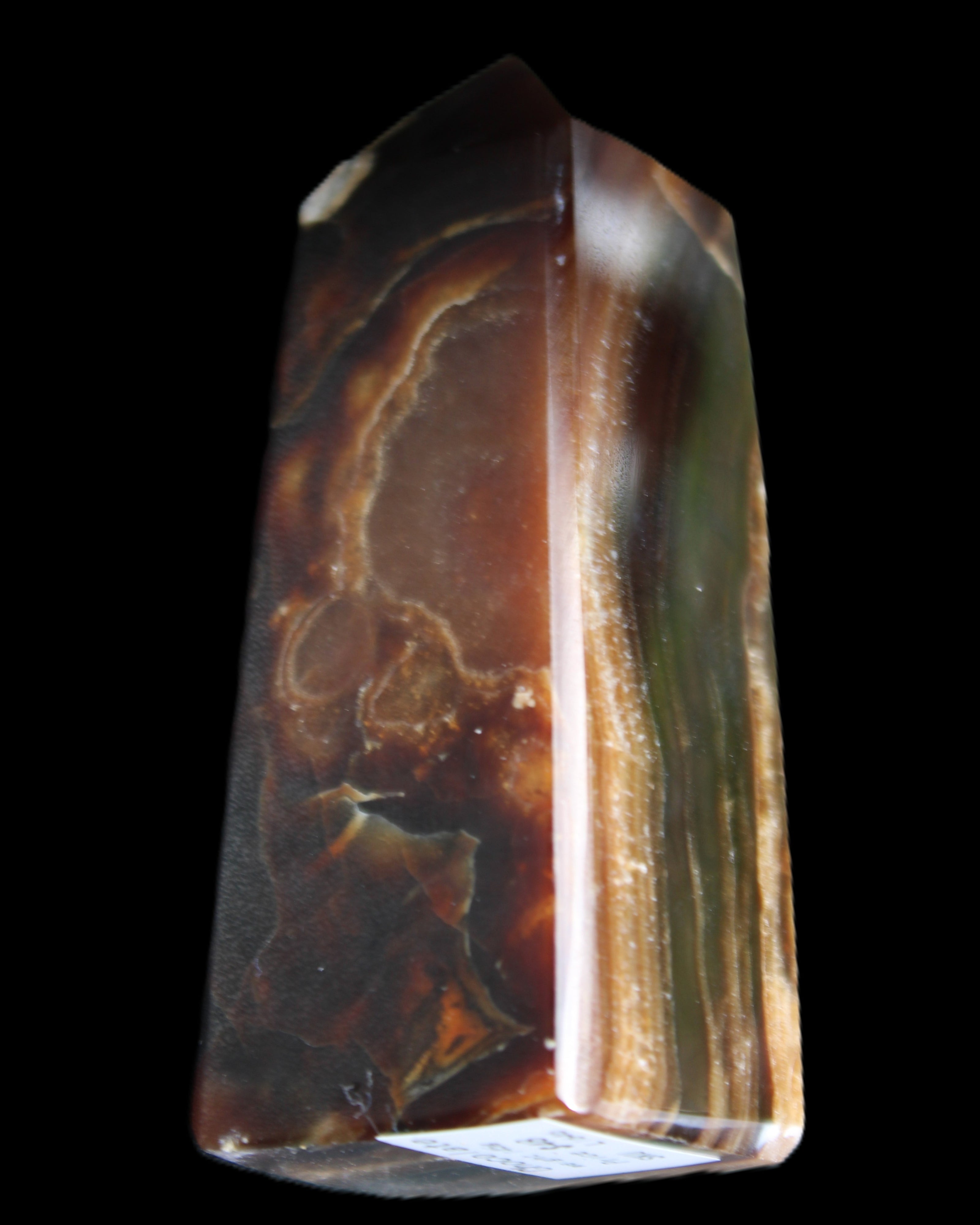 Chocolate Calcite obelisk 78*31*28mm 145g in sunlight - Rocks and Things Store
