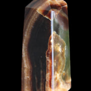 Chocolate Calcite obelisk 78*31*28mm 145g in sunlight - Rocks and Things Store