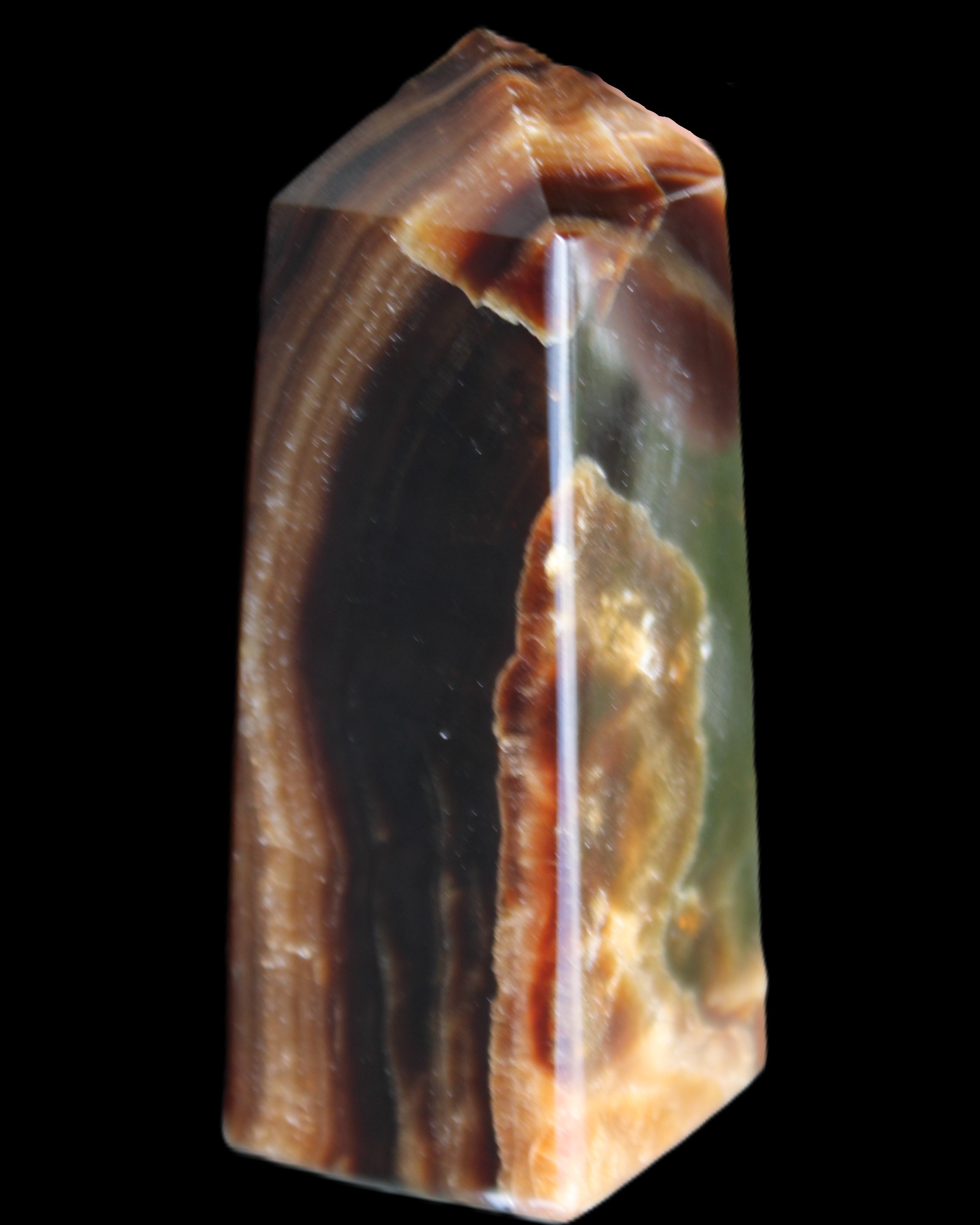 Chocolate Calcite obelisk 78*31*28mm 145g in sunlight - Rocks and Things Store