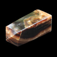 Chocolate Calcite obelisk 78*31*28mm 145g in sunlight - Rocks and Things Store