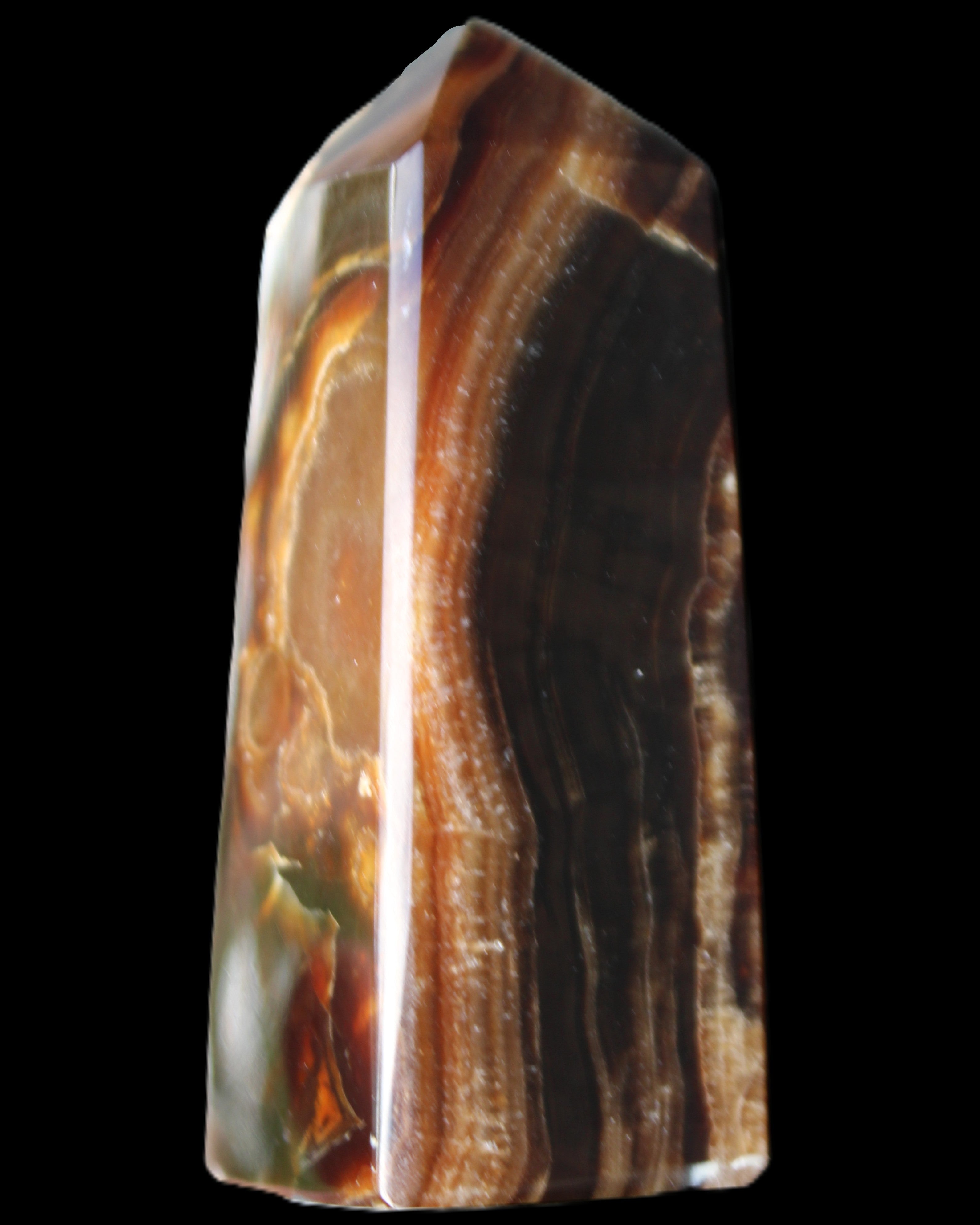 Chocolate Calcite obelisk 78*31*28mm 145g in sunlight - Rocks and Things Store