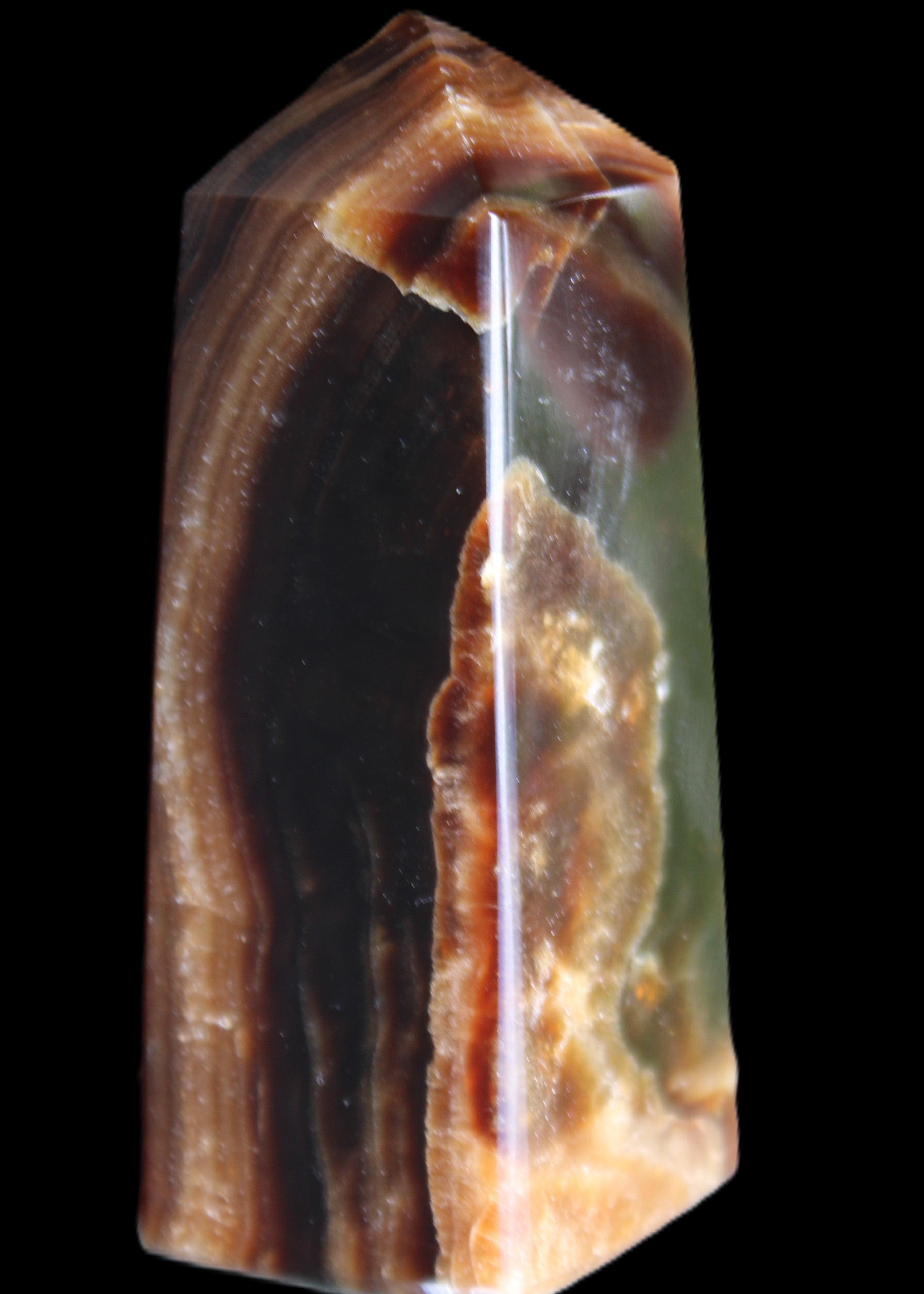 Chocolate Calcite obelisk 78*31*28mm 145g in sunlight - Rocks and Things Store