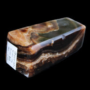 Chocolate Calcite obelisk 78*31*28mm 145g in sunlight - Rocks and Things Store