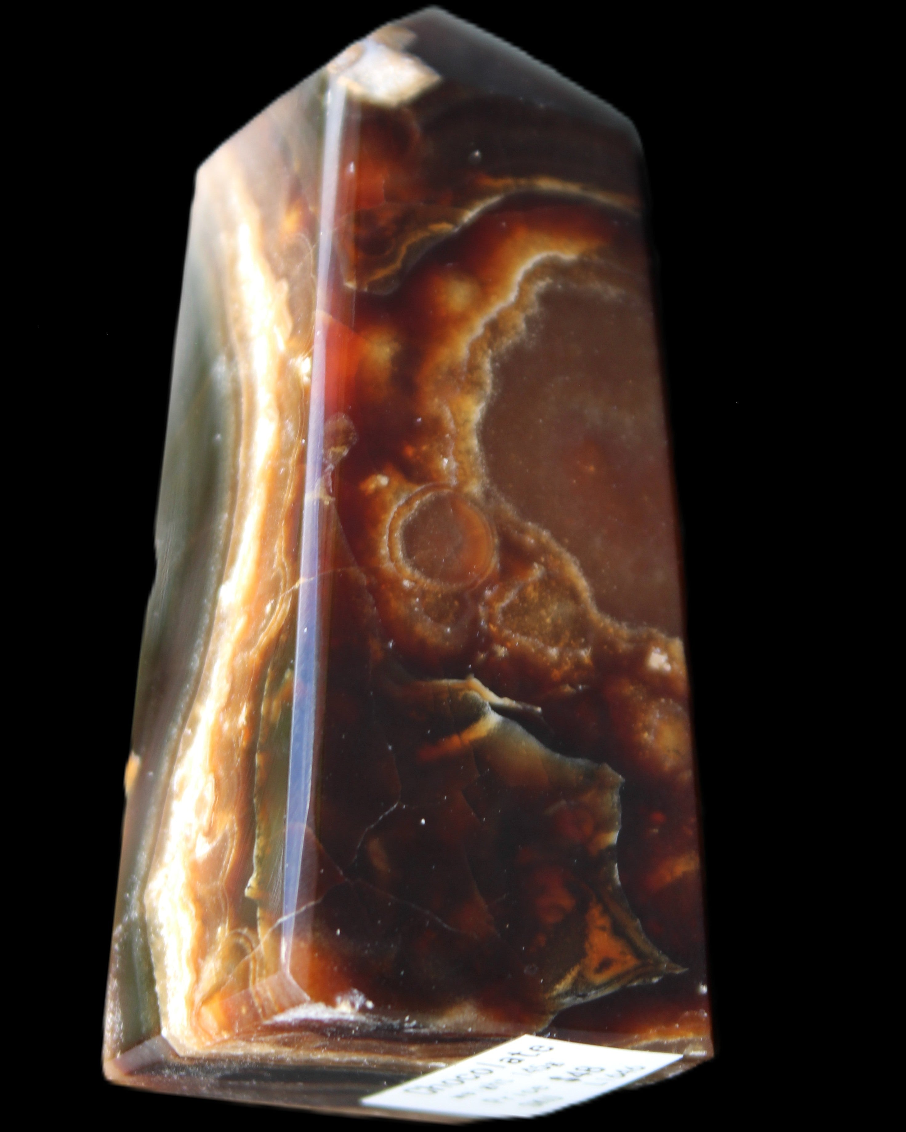 Chocolate Calcite obelisk 78*31*28mm 145g in sunlight - Rocks and Things Store