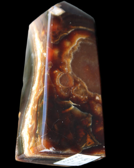 Chocolate Calcite obelisk 78*31*28mm 145g in sunlight - Rocks and Things Store