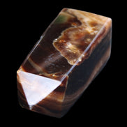 Chocolate Calcite obelisk 78*31*28mm 145g in sunlight - Rocks and Things Store