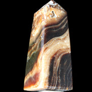 Chocolate Calcite obelisk 83*32*30mm 147.5g in sunlight - Rocks and Things Store