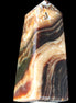 Chocolate Calcite obelisk 83*32*30mm 147.5g in sunlight - Rocks and Things Store