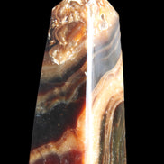 Chocolate Calcite obelisk 83*32*30mm 147.5g in sunlight - Rocks and Things Store
