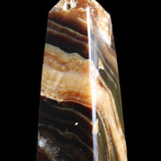 Chocolate Calcite obelisk 83*32*30mm 147.5g in sunlight - Rocks and Things Store