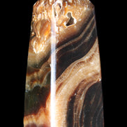 Chocolate Calcite obelisk 83*32*30mm 147.5g in sunlight - Rocks and Things Store