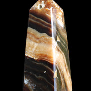 Chocolate Calcite obelisk 83*32*30mm 147.5g in sunlight - Rocks and Things Store