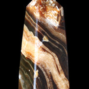 Chocolate Calcite obelisk 83*32*30mm 147.5g in sunlight - Rocks and Things Store