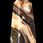 Chocolate Calcite obelisk 83*32*30mm 147.5g in sunlight - Rocks and Things Store
