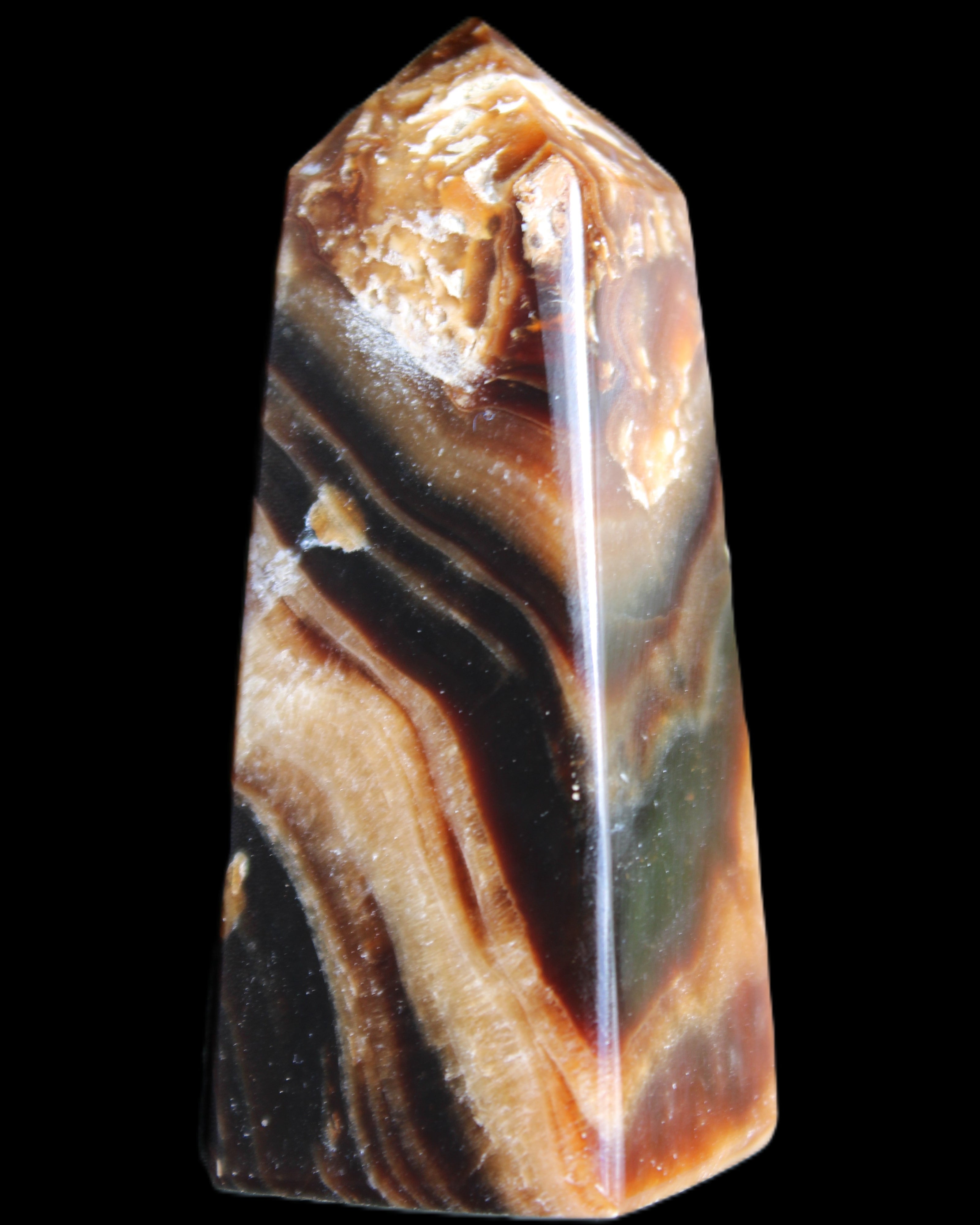 Chocolate Calcite obelisk 83*32*30mm 147.5g in sunlight - Rocks and Things Store
