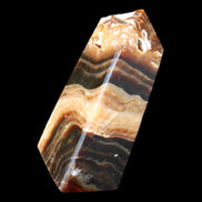Chocolate Calcite obelisk 83*32*30mm 147.5g in sunlight - Rocks and Things Store