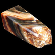 Chocolate Calcite obelisk 83*32*30mm 147.5g in sunlight - Rocks and Things Store