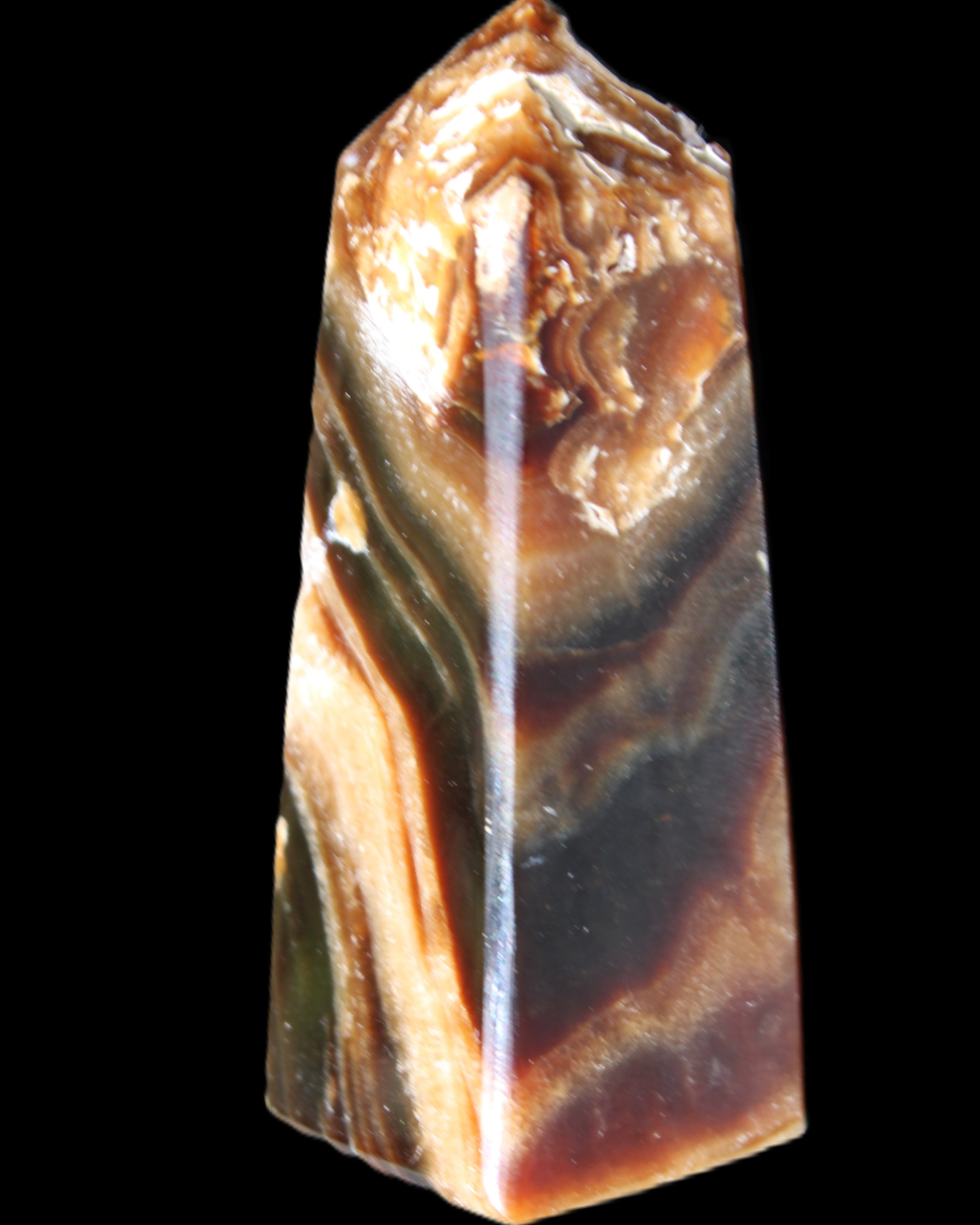 Chocolate Calcite obelisk 83*32*30mm 147.5g in sunlight - Rocks and Things Store