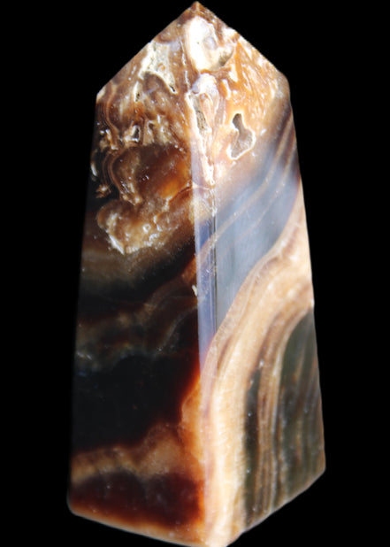 Chocolate Calcite obelisk 83*32*30mm 147.5g in sunlight - Rocks and Things Store