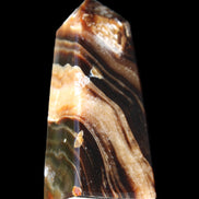 Chocolate Calcite obelisk 83*32*30mm 147.5g in sunlight - Rocks and Things Store