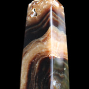 Chocolate Calcite obelisk 83*32*30mm 147.5g in sunlight - Rocks and Things Store