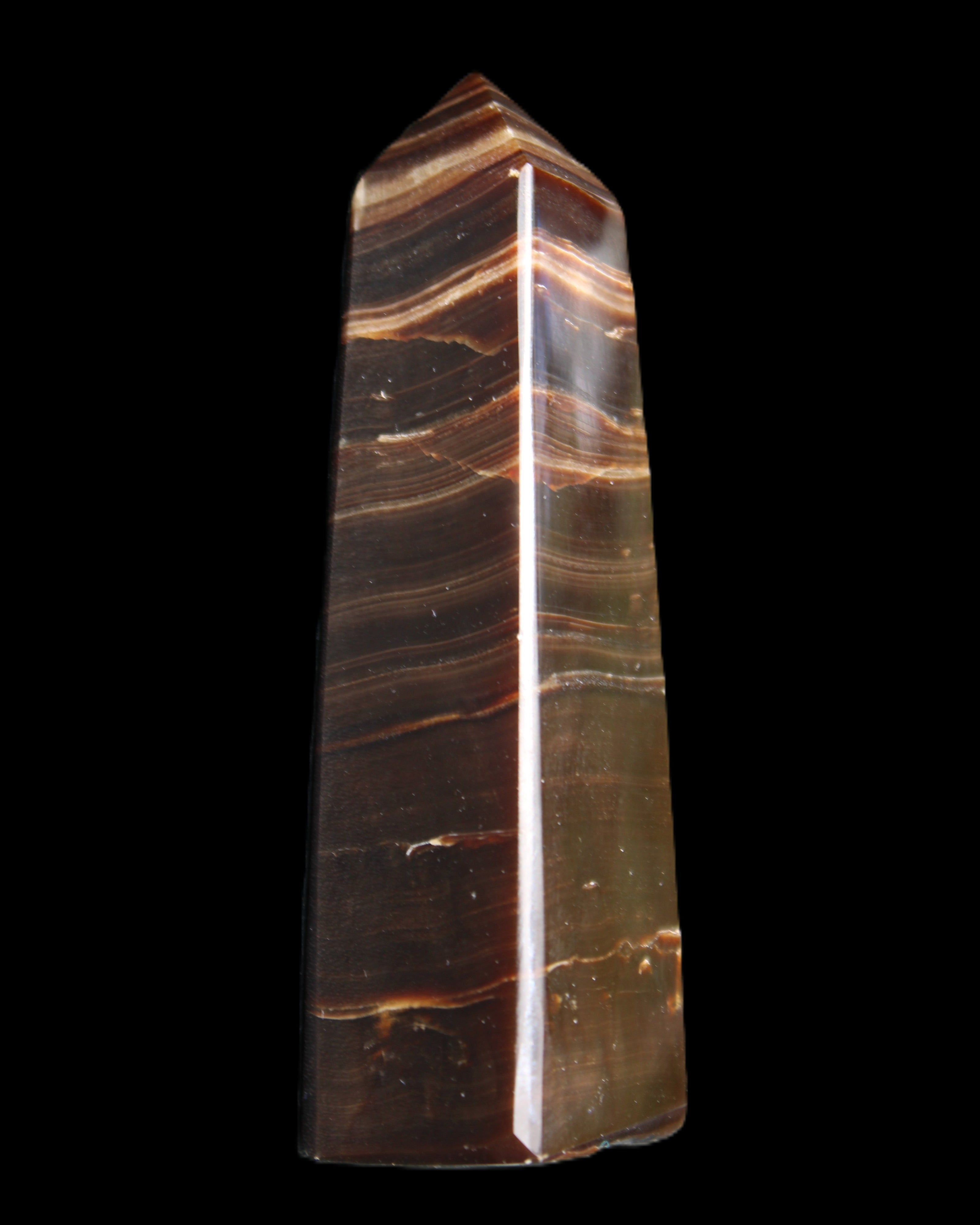 Chocolate Calcite obelisk 87*24*22mm 90.8g in sunlight - Rocks and Things Store