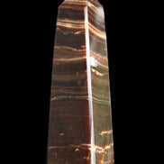 Chocolate Calcite obelisk 87*24*22mm 90.8g in sunlight - Rocks and Things Store