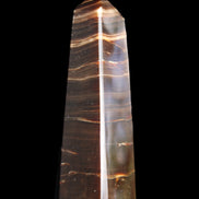 Chocolate Calcite obelisk 87*24*22mm 90.8g in sunlight - Rocks and Things Store