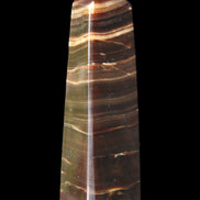 Chocolate Calcite obelisk 87*24*22mm 90.8g in sunlight - Rocks and Things Store