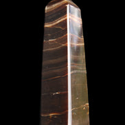 Chocolate Calcite obelisk 87*24*22mm 90.8g in sunlight - Rocks and Things Store