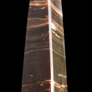 Chocolate Calcite obelisk 87*24*22mm 90.8g in sunlight - Rocks and Things Store