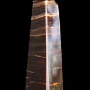 Chocolate Calcite obelisk 87*24*22mm 90.8g in sunlight - Rocks and Things Store