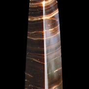Chocolate Calcite obelisk 87*24*22mm 90.8g in sunlight - Rocks and Things Store