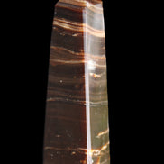 Chocolate Calcite obelisk 87*24*22mm 90.8g in sunlight - Rocks and Things Store