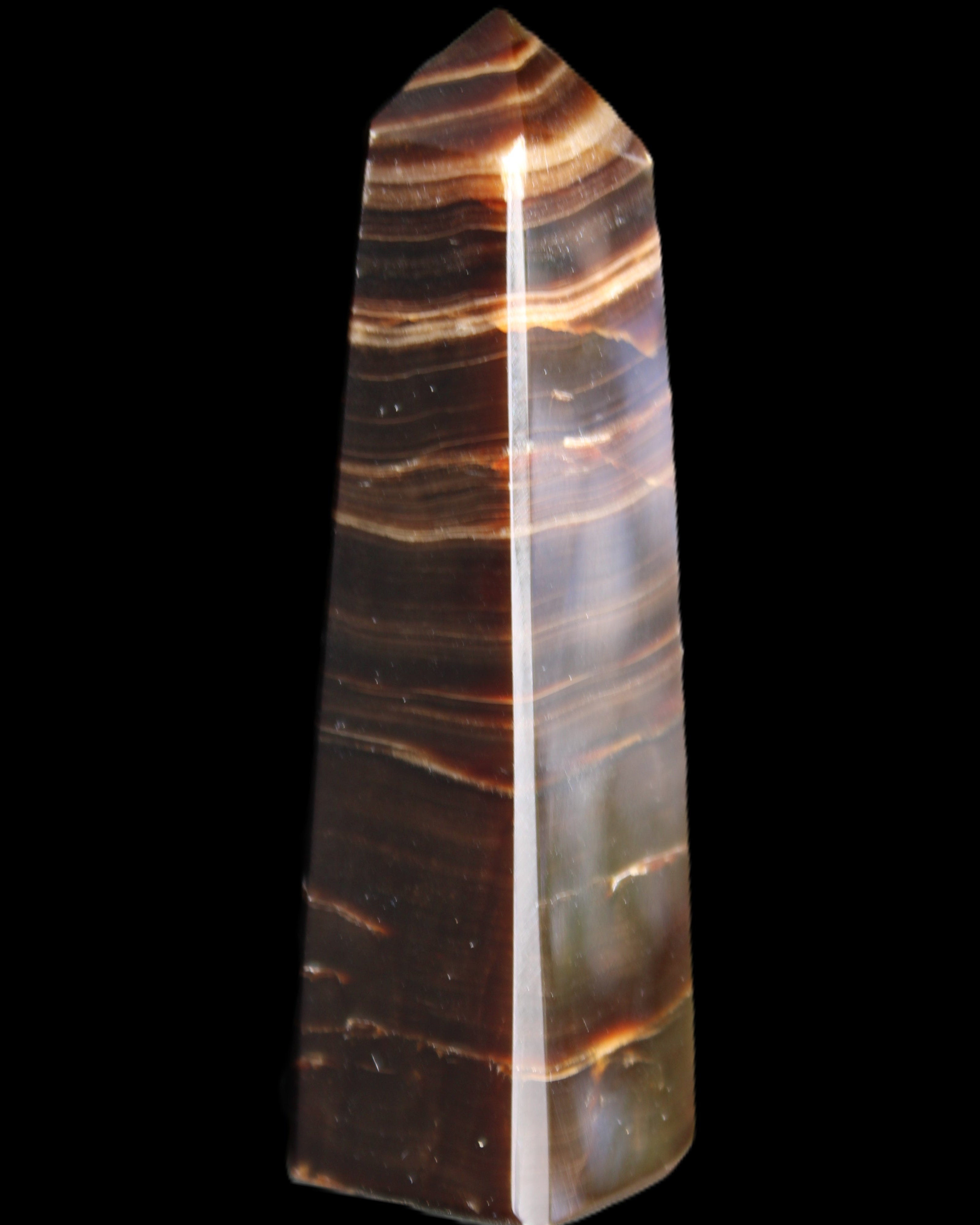 Chocolate Calcite obelisk 87*24*22mm 90.8g in sunlight - Rocks and Things Store