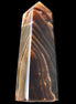 Chocolate Calcite obelisk 78*29*18mm 84g in sunlight - Rocks and Things Store