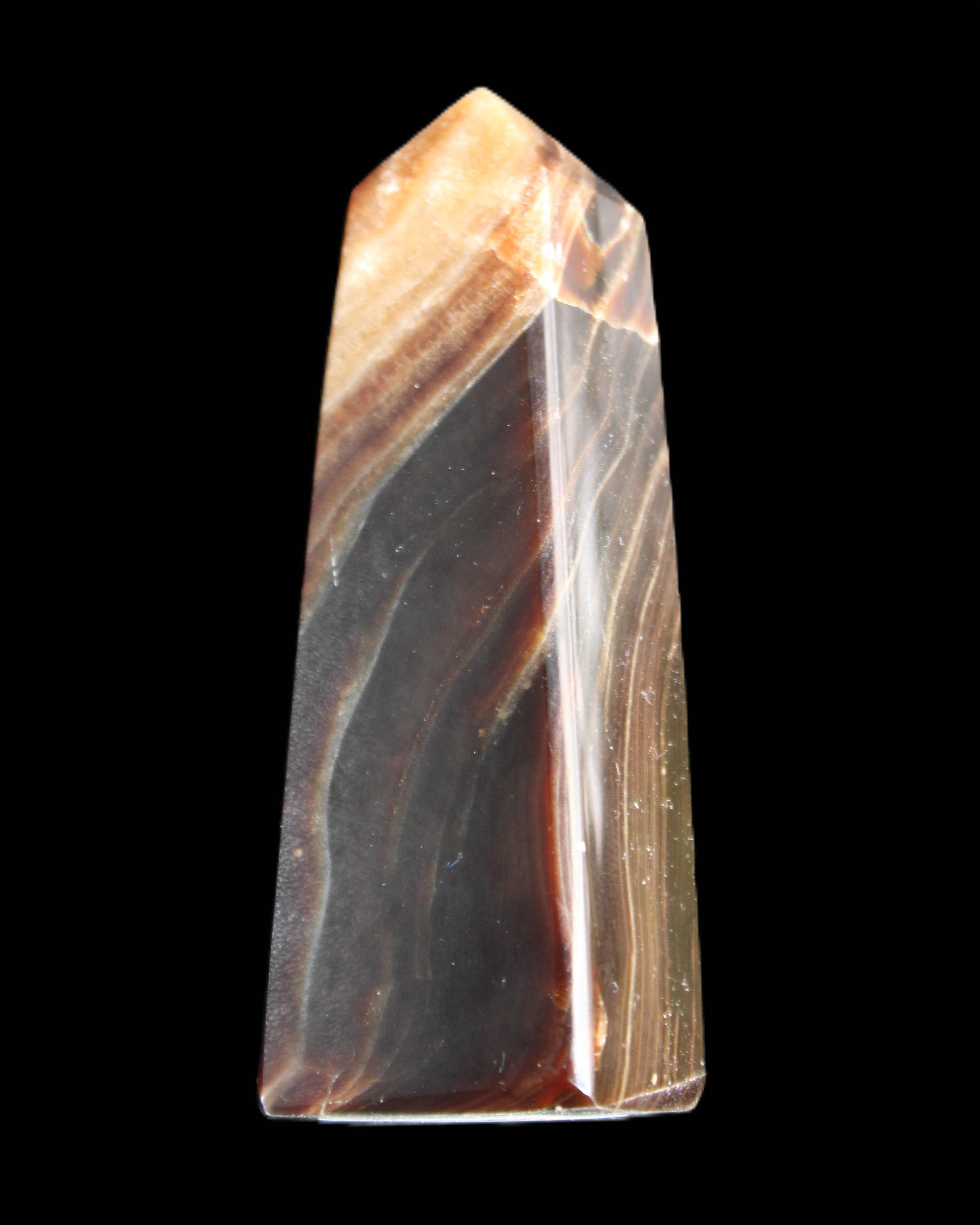 Chocolate Calcite obelisk 78*29*18mm 84g in sunlight - Rocks and Things Store