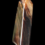 Chocolate Calcite obelisk 78*29*18mm 84g in sunlight - Rocks and Things Store
